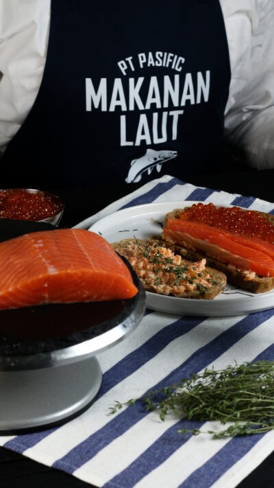smoked salmon, red caviar and salmon spread set on a plate