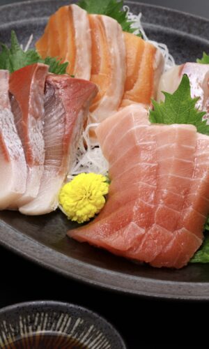 fresh sashimi set bali tuna saku and salmon fillet on plate
