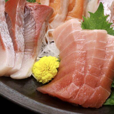 fresh sashimi set bali tuna saku and salmon fillet on plate