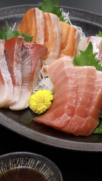 fresh sashimi set bali tuna saku and salmon fillet on plate