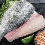 barramundi fillet bali – fresh skin-on barramundi fillet with lime and pink salt