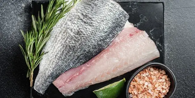 barramundi fillet bali – fresh skin-on barramundi fillet with lime and pink salt