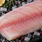 buy red snapper fillet bali – fresh snapper fillet close-up on ice with lemon