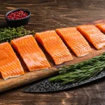 fresh salmon bali – sliced raw salmon fillet with thyme and rosemary